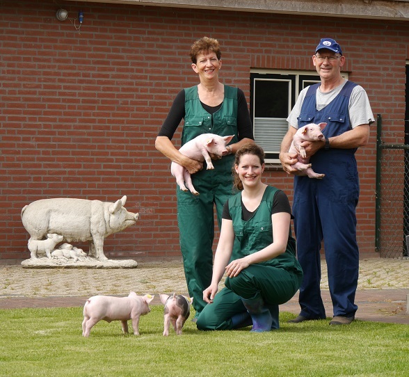 Family Relou in front of their house